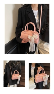 Three-view layout of a pink Boston handbag with a pearl lace bow and adjustable strap