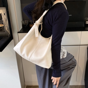 Minimalist white lychee leather tote bag for women with spacious shoulder strap design