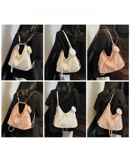 Multiple views of a versatile hobo bag and mini pouch in glossy white and pink synthetic leather