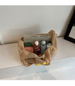 Spacious interior of beige hollow woven tote bag showing large capacity for essentials