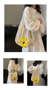 Detail of hand-woven crochet tote bag with large mesh and yellow floral knit accent