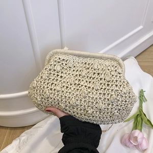 Off-white woven cloud clutch bag with gold chain and spherical texture for summer vacation