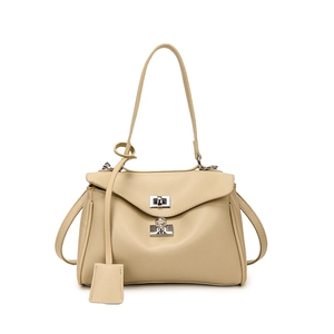 Minimalist beige leather tote bag with silver metallic twist lock and long shoulder strap