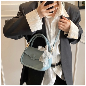 Light blue crossbody tote with litchi texture and elegant white lace bow detail