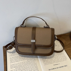 Retro brown canvas and faux leather satchel handbag with top handle and shoulder strap