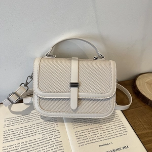 Cream woven small crossbody bag with leather trim and top handle for women