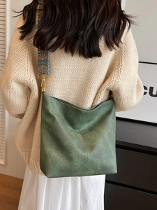 Retro forest green suede tote bag with stylish colorful ethnic pattern woven strap