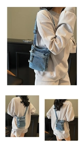 Vista dettagliata della borsa a tracolla in denim blu con bordi sfrangiati e tracolla
