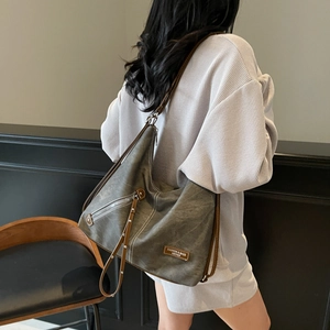 Vintage grey-green large capacity tote bag with brown leather trim and metal zipper detail