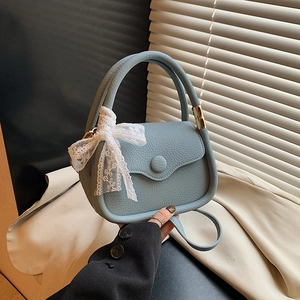 Light blue faux leather mini handbag with white lace bow and elegant top handle