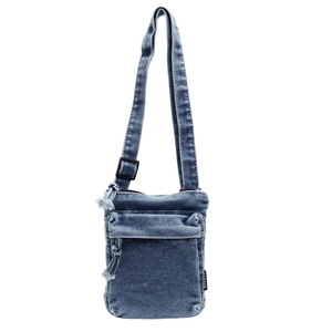 Borsa a tracolla verticale in denim blu con tasca a frange e tracolla regolabile