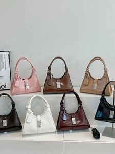 Chic ruched dumpling bags in seven vibrant colors with glossy finish and silver buckles