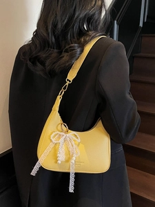 Sacoche jaune avec nœud de perles en cuir à texture litchi au style coréen chic