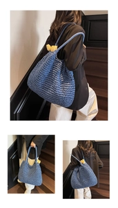 Detailed knit texture of a blue handmade crochet tote bag for summer beach travel