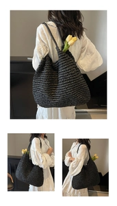 Detail of hand-woven black straw tote bag featuring tight texture and long shoulder straps
