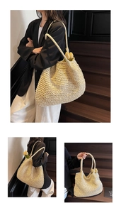 Detailed close-up of large woven beige tote bag for women showing texture and capacity