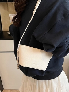 Women's Korean Minimalist PU Litchi Grain Bucket Bag Adjustable Strap Shoulder Crossbody Bag With Metallic Heart Pendant