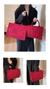 Detail of red jacquard floral embroidered tote bags in large and small sizes