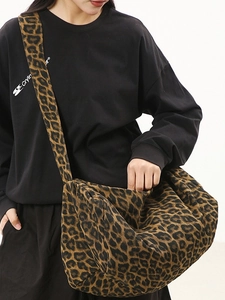 Large leopard print canvas crossbody bag featuring retro street style with wide strap