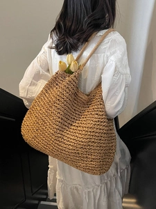 Large capacity straw woven tote bag for women featuring handmade texture in light brown