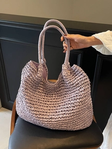 Handcrafted purple woven tote bag with large capacity and soft handles for casual daily use