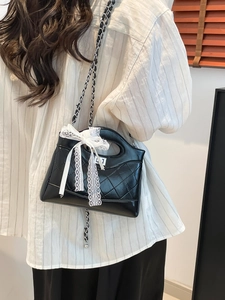 Quilted black leather handbag with white lace bow and metal chain strap for women