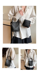 Detail view of black lychee grain mini bucket bag with matching zipper coin purse