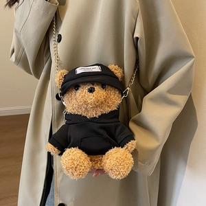 Cute brown plush bear crossbody bag with black hoodie and elegant gold metal chain strap