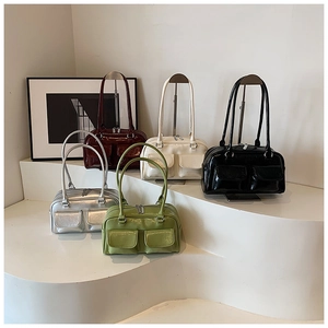 Detailed view of glossy tote bags in five colors with symmetrical front pockets