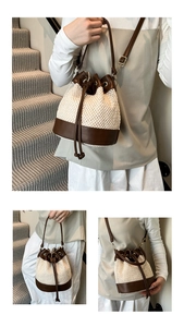 Detail of contrast stitching straw bucket bag with leather strap shown in different angles