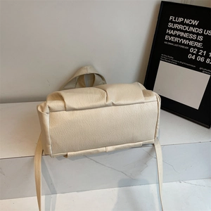 Minimalist cream white large capacity shoulder bag with pleated base and soft leather texture