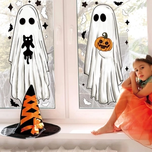 Halloween window clings featuring ghosts, bats, and pumpkins in a cozy home setting