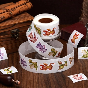 Detailed view of colorful cartoon dragon sticker roll on a vintage desk with stationery