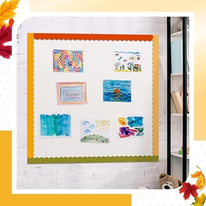 Detail view of colorful scalloped border trim on a classroom whiteboard display