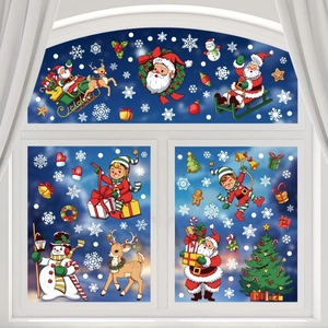 Detailed Christmas window decals showing Santa, reindeer, and snowmen on a glass surface