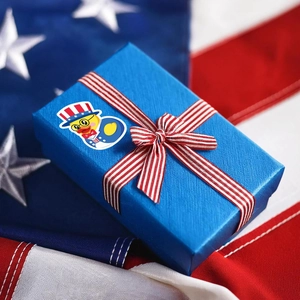 500PCS Patriotic Rubber Duck Stickers on blue gift box with red and white striped ribbon