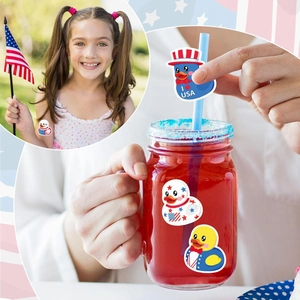 Detail of patriotic rubber duck stickers applied on glass jars and straws for decor