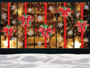 Detailed Christmas window stickers featuring red bows and white snowflakes on glass