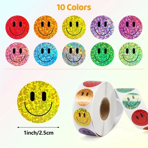 Detail of 1-inch glitter star smiley stickers in ten vibrant holographic colors