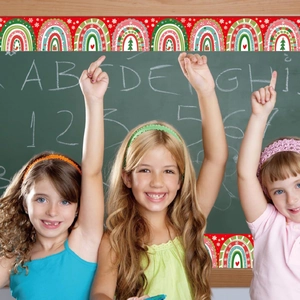Christmas bulletin board borders with rainbows and snowflakes in a school classroom setting