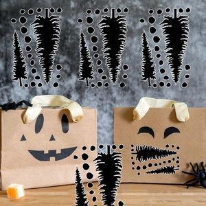 Close-up of black pine tree silhouette stickers on kraft paper bags for DIY decor