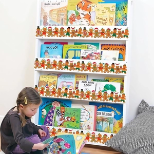 Detail of gingerbread man Christmas border trim used for decorating a white classroom bookshelf