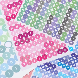 Colorful round alphabet and number stickers set for teacher classroom organization
