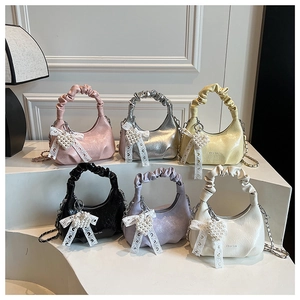 Detailed collection of small pleated handbags in six colors with heart pearl pendants