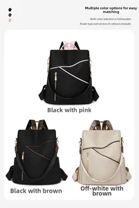 Three multi-color soft leather backpacks with gold zippers and multi-pocket design