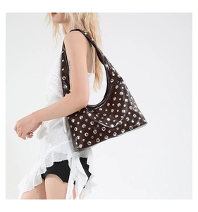 Detailed view of the stylish studded hobo shoulder bag showcasing punk rock aesthetics.