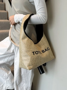 Straw woven tote bag with Tote Bag embroidery and black handles for summer vacation