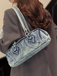 Fashionable denim Boston shoulder bag with silver rivets and vintage washed blue finish