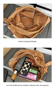 Large capacity brown canvas bag interior showing space for tablet, umbrella and A4 magazine