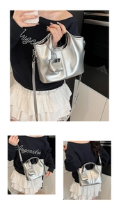 Detail of silver metallic tote bag with matching mini pouch and adjustable strap
